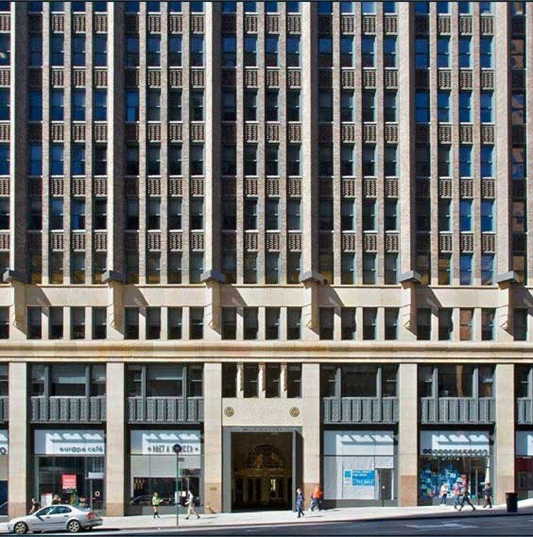 Exterior view of the historic stone facade at 2 Park Avenue.