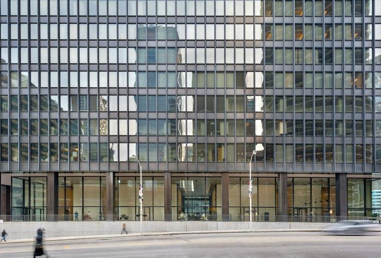 Exterior view of the dark, modernist glass skyscraper at 330 N. Wabash, Chicago, Illinois.
