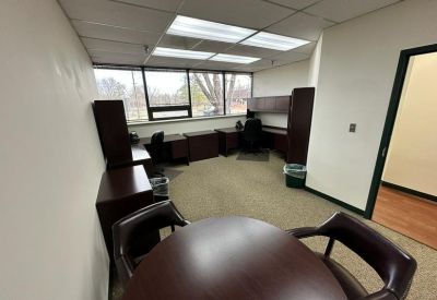Spacious office interior with desks and natural light at 10015 Old Columbia Rd, Suite B215, Columbia.