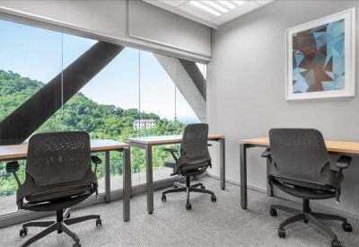 Private office for three with ergonomic chairs and panoramic mountain views.