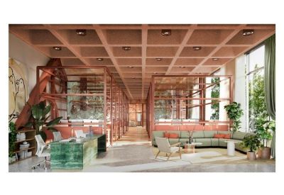 Modern reception area with a green marble desk and light-filled lounge seating.