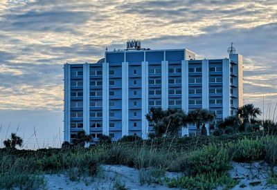 Exterior view of the beachside building at 1980 N Atlantic Ave.