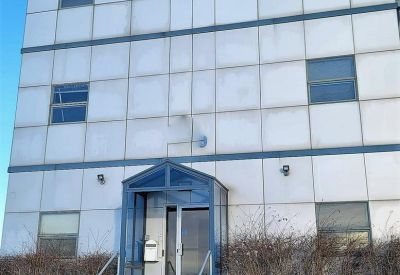 Exterior view of the white paneled building facade at 350 Allstate Parkway.