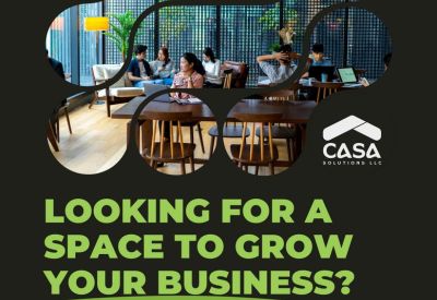 Marketing graphic showing people working in the communal lounge area at Roads Consulting Group Headquarters.