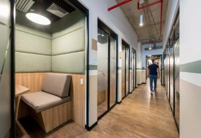 Office corridor featuring private phone booths, Club Golf Los Incas, Lima, Peru