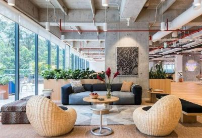 Lounge area with plush seating and greenery