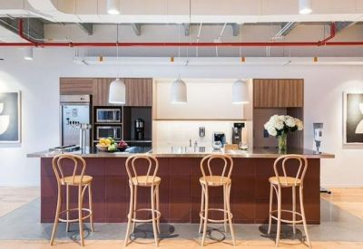Kitchen space with bar seating and modern appliances