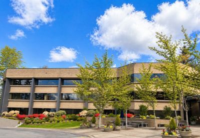 Exterior view of the landscaped office building at 11808, Northup Way, Suite 300 (BV3).