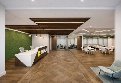 Reception area with a white geometric desk and a vibrant green feature wall.