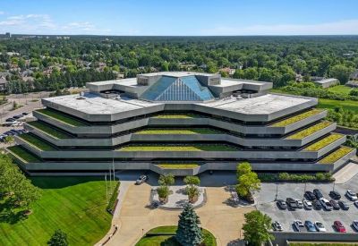 Close-up aerial view of the building's unique tiered architecture.