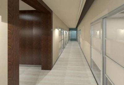 Brightly lit office corridor with wood-paneled walls and glass doors.