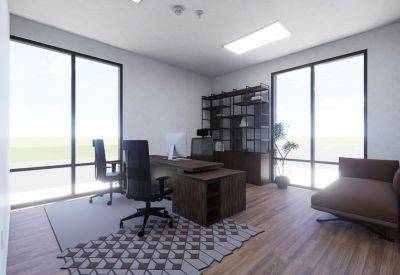 Executive office with dark wood desks and a geometric patterned rug.