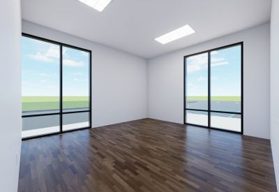 Empty office suite with dark wood flooring and large windows.