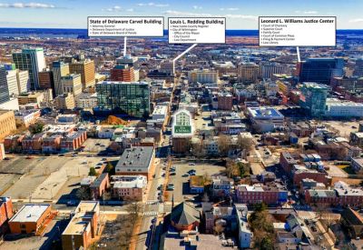 Aerial view of downtown Wilmington highlighting the building's central location.