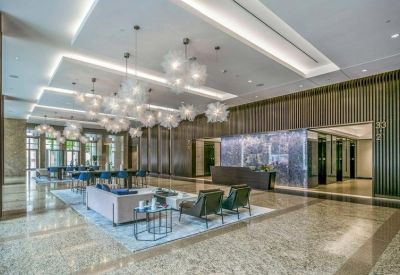 Luxurious lobby with elegant lighting and seating.
