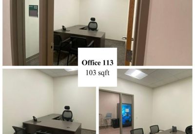 Internal office with two chairs and desk.