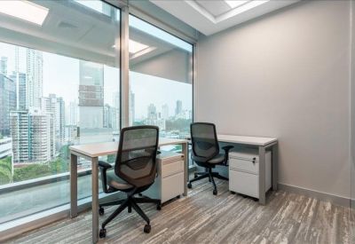 Bright two-person office with floor-to-ceiling windows and panoramic city views.