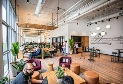 Open workspace with vibrant seating and natural light.