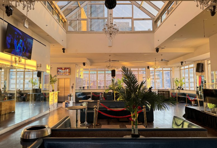 Large open-plan lounge at 617, West 46th Street, PH Floor with high ceilings and skylights.