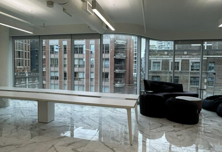 Spacious open-plan office at 7, Saint Thomas Street, 503 featuring marble floors and large windows.