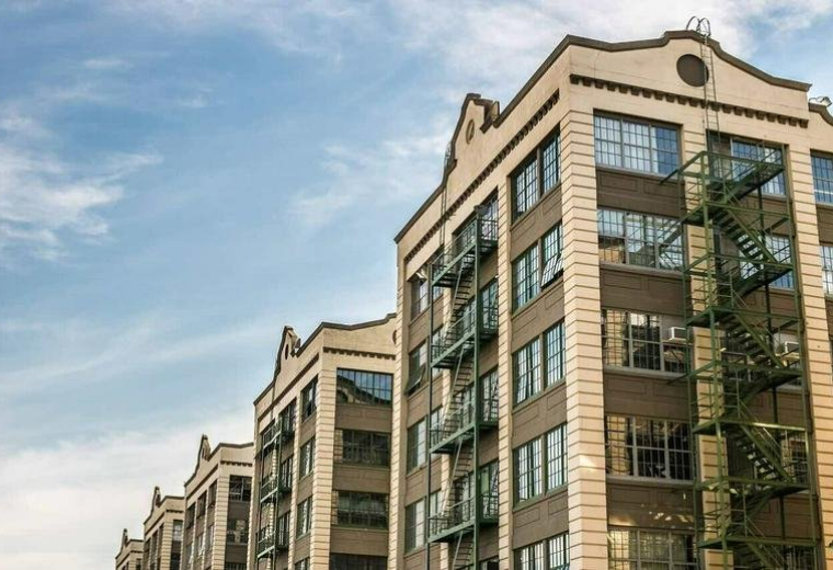 Exterior view of the industrial-style brick building at 220, 36th Street, Sunset Park, New York City.