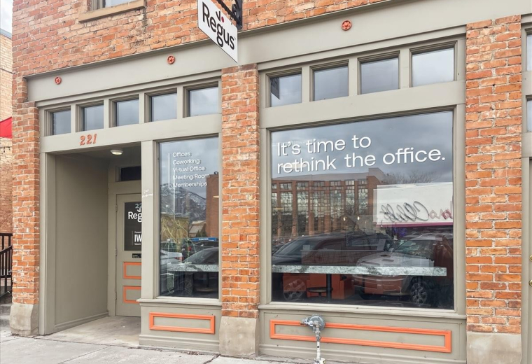 Exterior brick facade of the Regus office building at 221 25th Street.