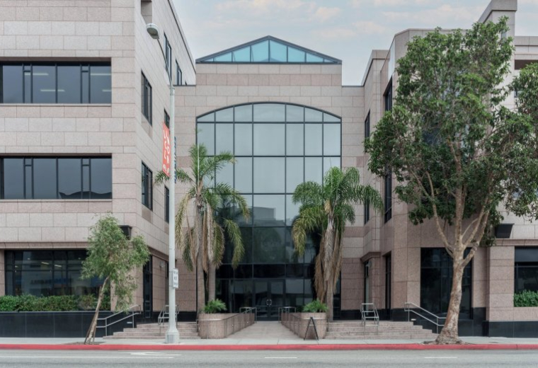 Exterior view of the granite and glass facade at 808 Wilshire Boulevard, 2nd Floor, Santa Monica.