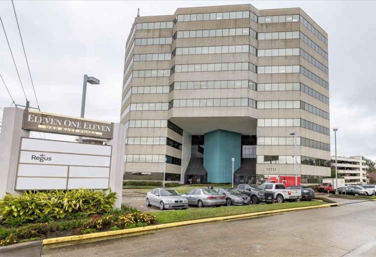 Exterior view of the multi-story office building at 11111 Katy Freeway.