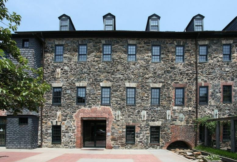 Exterior view of the historic stone-facade building at 1340 Smith Avenue Suite 200.