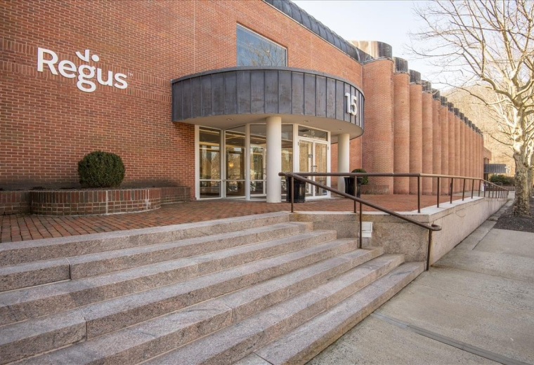 Exterior brick facade and entrance stairs at 15 River Road, 15B, Wilton Executive.