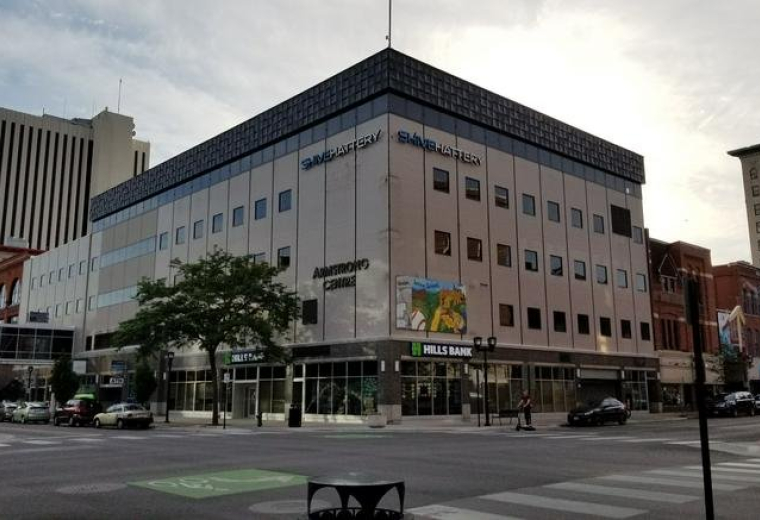 Exterior view of the multi-story office building at 222 3rd Avenue Southeast, Suite 400.