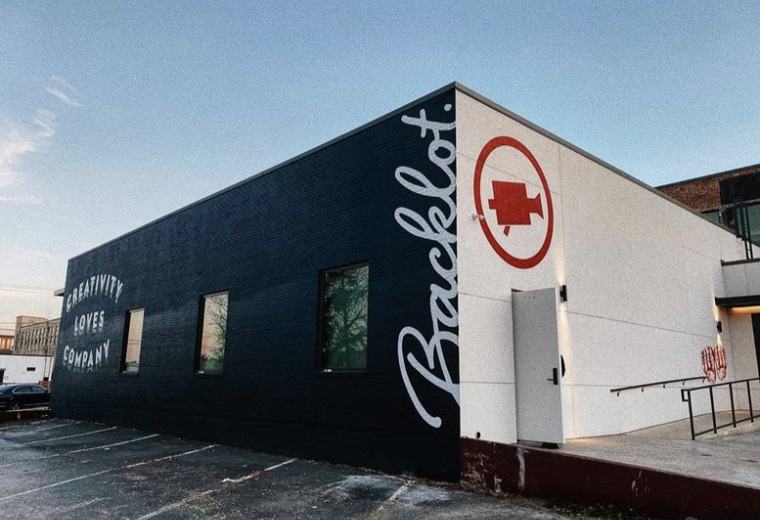 Exterior view of the black and white Backlot building at 329, South Main Street.