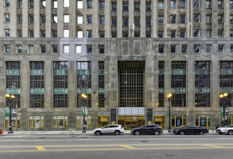Ground-level exterior view of the historic Art Deco facade of 33 N La Salle St.