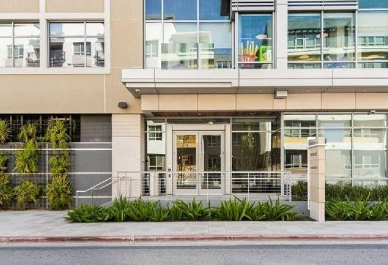 Exterior entrance of the modern office building at 400 Concar Drive.