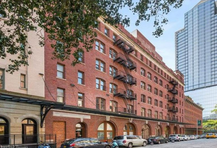 Exterior view of the classic red brick building at 53 Beach Street, New York City.