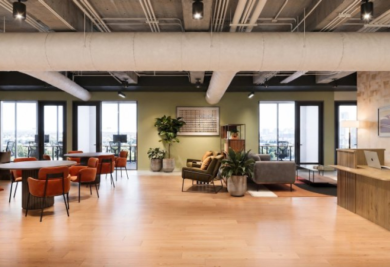Spacious communal lounge and reception area at 8484 Wilshire Boulevard, Suite 900.
