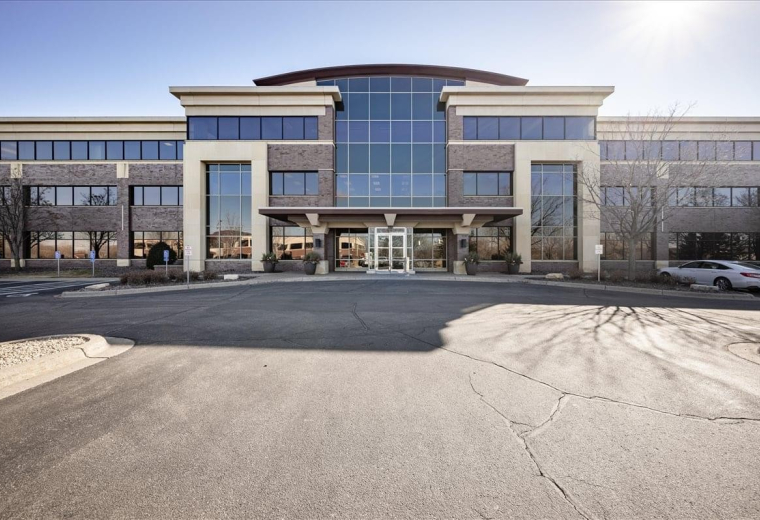 Exterior view of the multi-story professional building at 860 Blue Gentian Road, Suite 200.