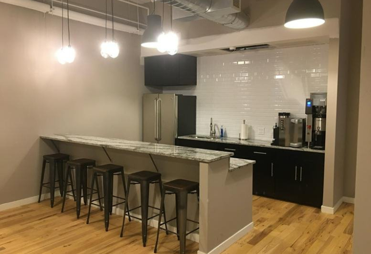 Spacious communal kitchen and breakout area at 90 Broad Street, 2nd & 3rd floor.