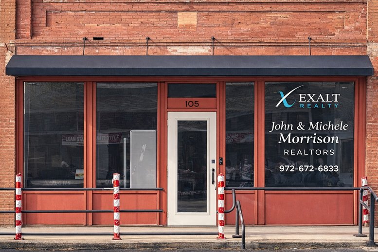 Exterior facade of Ten On The Bricks at 105, North 4th Street featuring red brick and large display windows.