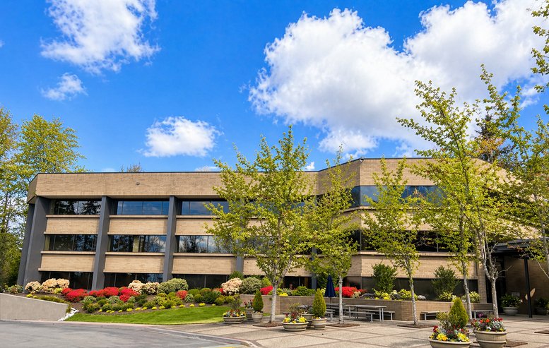 Exterior view of the landscaped office building at 11808, Northup Way, Suite 300 (BV3).