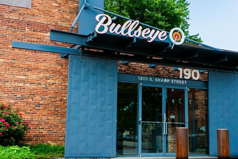 Building exterior showing the Bullseye signage at 1201, South Sharp Street, Suite 200.