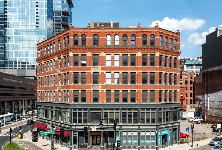 Exterior view of the historic red brick facade at 151 Merrimac Street.
