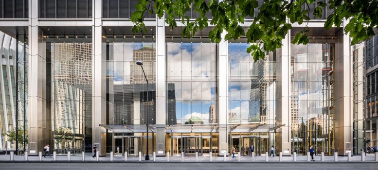Exterior view of the grand glass-facade entrance at 175 Greenwich Street.