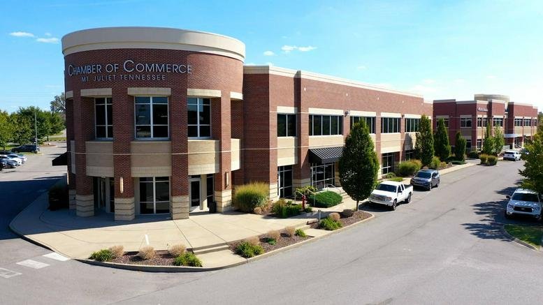 Exterior view of the brick facade building at 2055 North Mount Juliet Road, Suite 100.