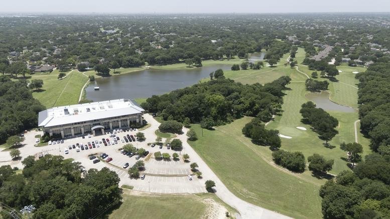 Aerial exterior view of the lakeside building at 2150 South Central Expressway Ste #200 in McKinney.