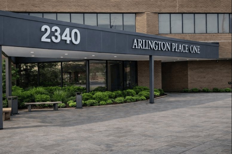 Modern charcoal building entrance and signage at 2340 S Arlington Heights Rd.
