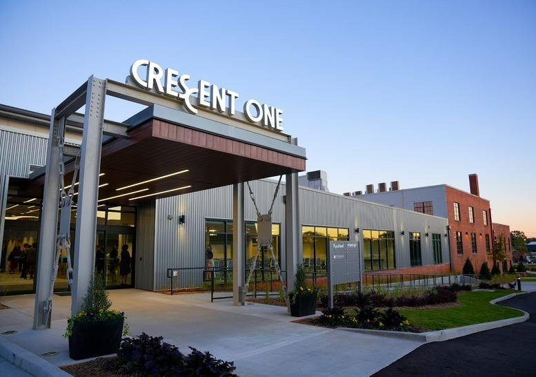 Exterior view of the entrance and facade of Crescent One at 25 Goldsmith Street.