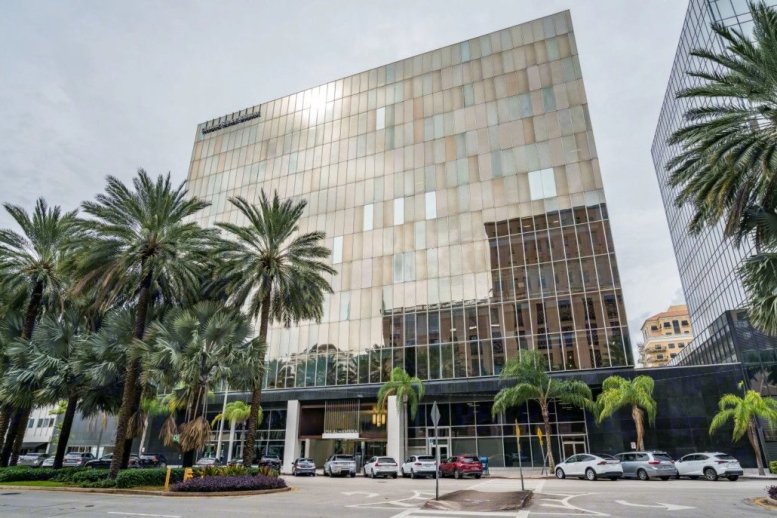Exterior view of the multi-story glass facade building at 255 Alhambra Circle.