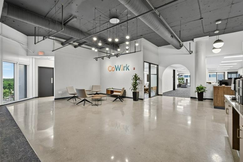 Spacious lobby at 3500, Depauw Boulevard, Ste 2060 with high industrial ceilings and polished floors.