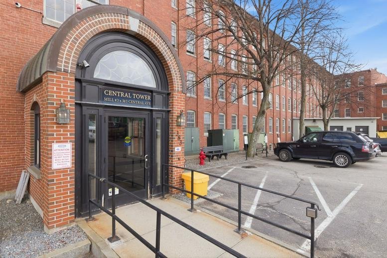 Exterior view of the arched brick entrance to the Central Tower at 383 Central Avenue.